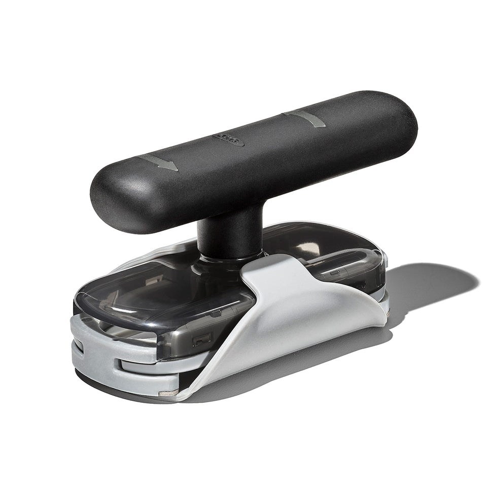 OXO Good Grips Twisting Jar Opener with Base Pad on counter shows non-slip stability for easy opening.