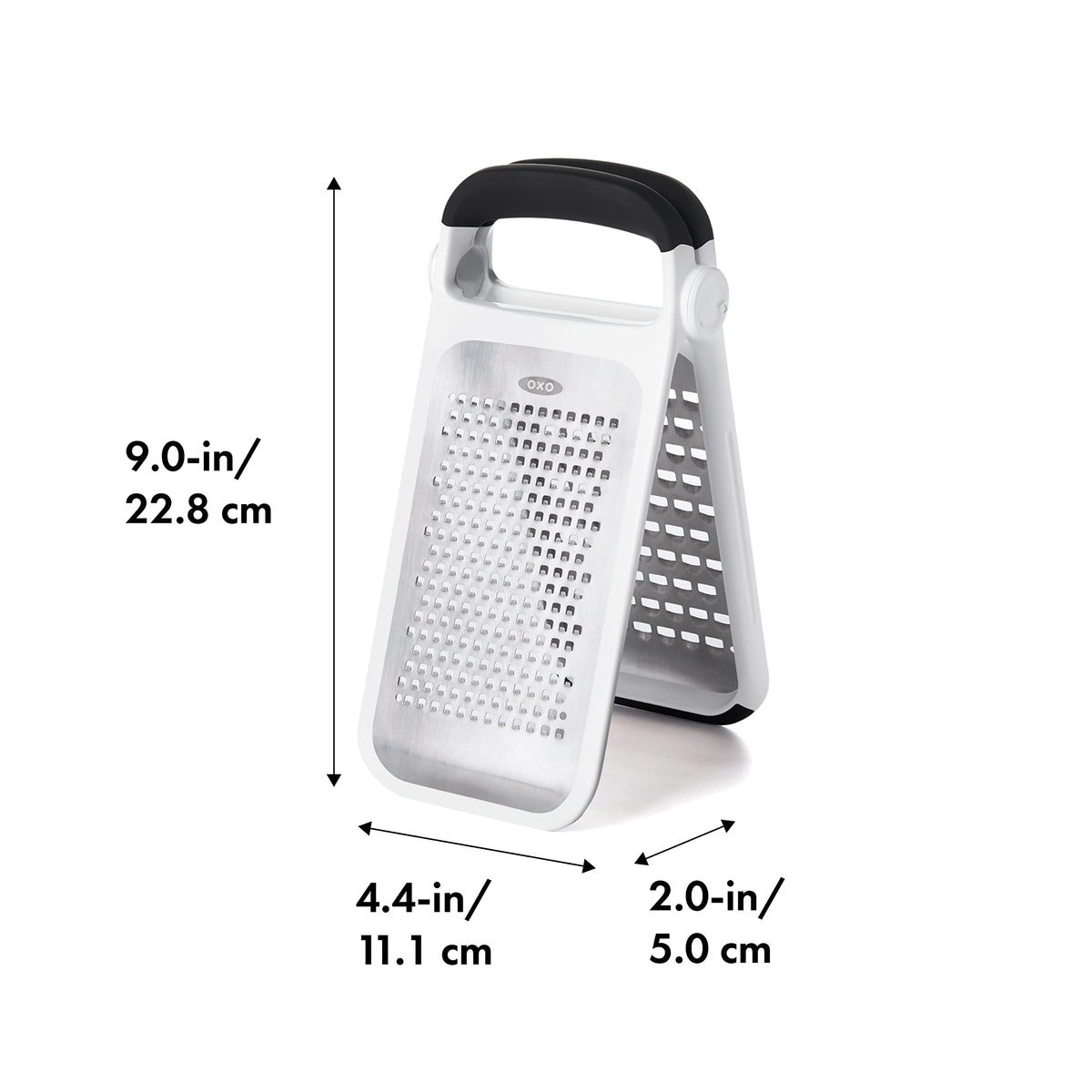 OXO Good Grips Two-Fold Etched Grater over a cutting board for flexible use