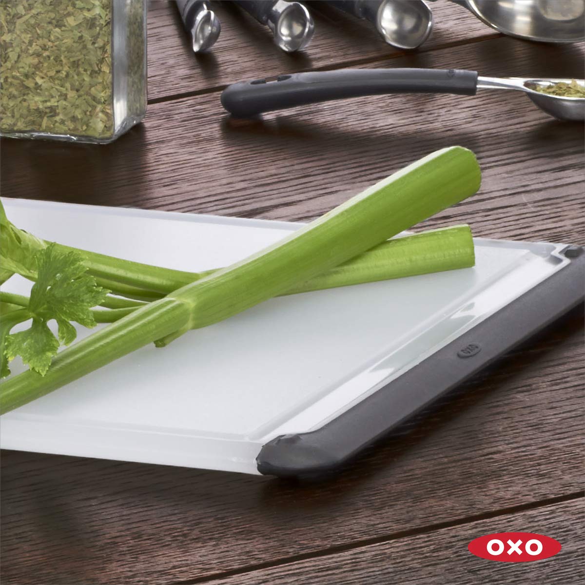 OXO Good Grips Utility Cutting Board, compact to fit on crowded counters while prepping meals.