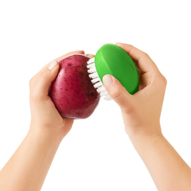 OXO Good Grips Vegetable Brush is dishwasher-safe for convenient post-use cleanup.