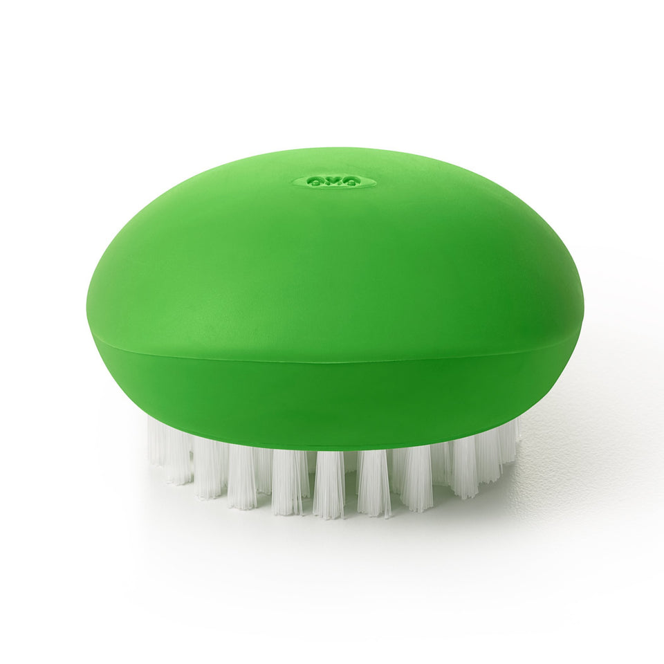 OXO Good Grips Vegetable Brush front view with nylon bristles for deep-cleaning produce.