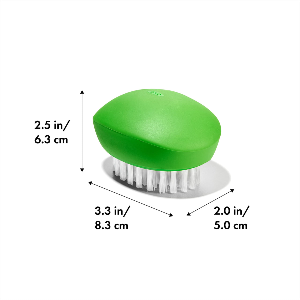 OXO Good Grips Vegetable Brush used on potatoes to remove dirt easily.