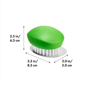 OXO Good Grips Vegetable Brush used on potatoes to remove dirt easily.