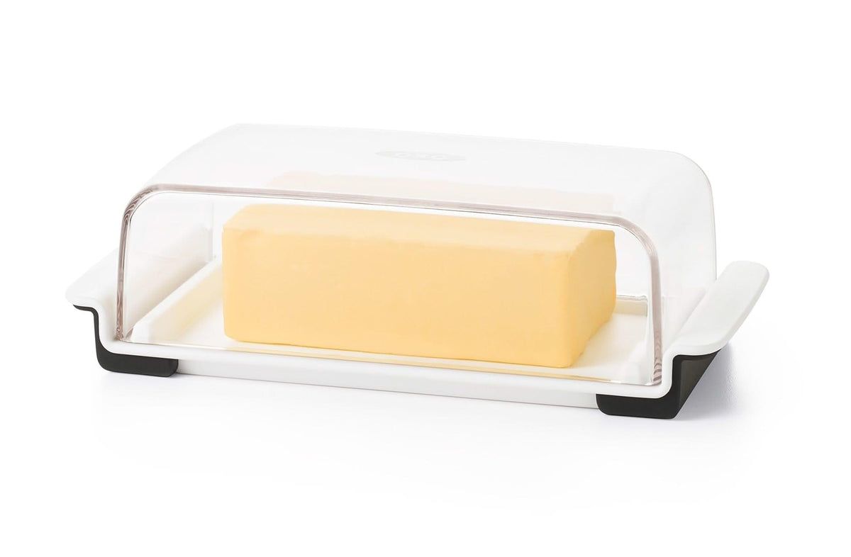 OXO Good Grips Wide Butter Dish with lid on; secure transport.