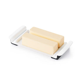 OXO Good Grips Wide Butter Dish with stoppers prevents slipping while cutting.