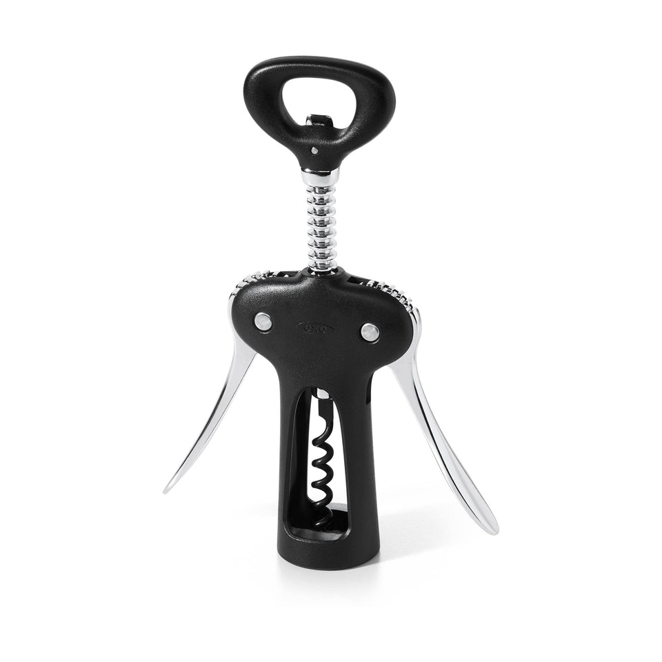 OXO Good Grips winged corkscrew with bottle opener in use on a bottle