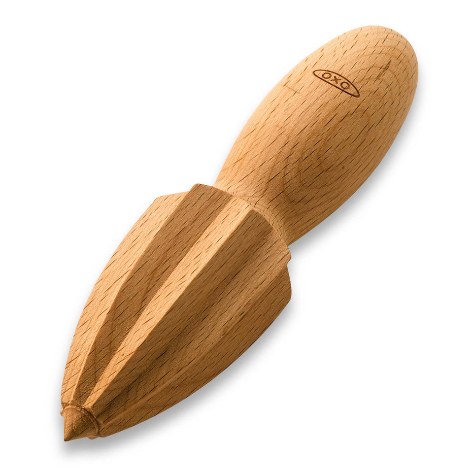 OXO Good Grips wooden citrus reamer close-up shows beechwood for easy juice extraction.