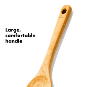 OXO Good Grips corner spoon reaches pan edges with control.