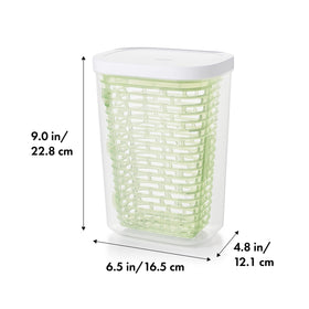OXO Greensaver basket holds herbs upright for even airflow.