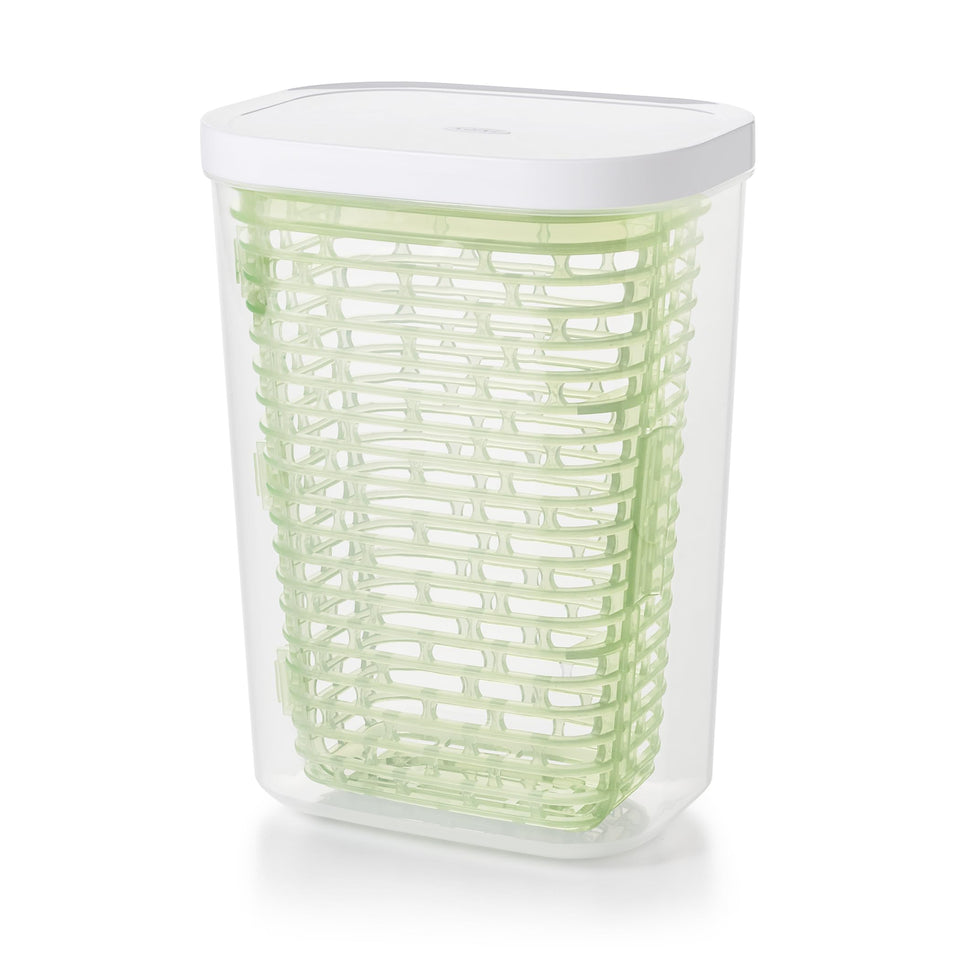 OXO Greensaver herb keeper with clear lid demonstrates humidity control for fresher herbs.