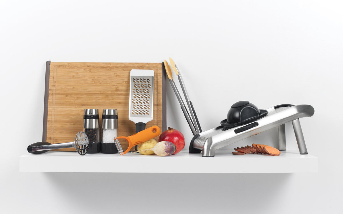 OXO pepper grinder cap-off refill setup for quick seasoning.