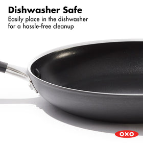 OXO frying pan's silicone-wrapped handle provides a secure grip and easy maneuvering.