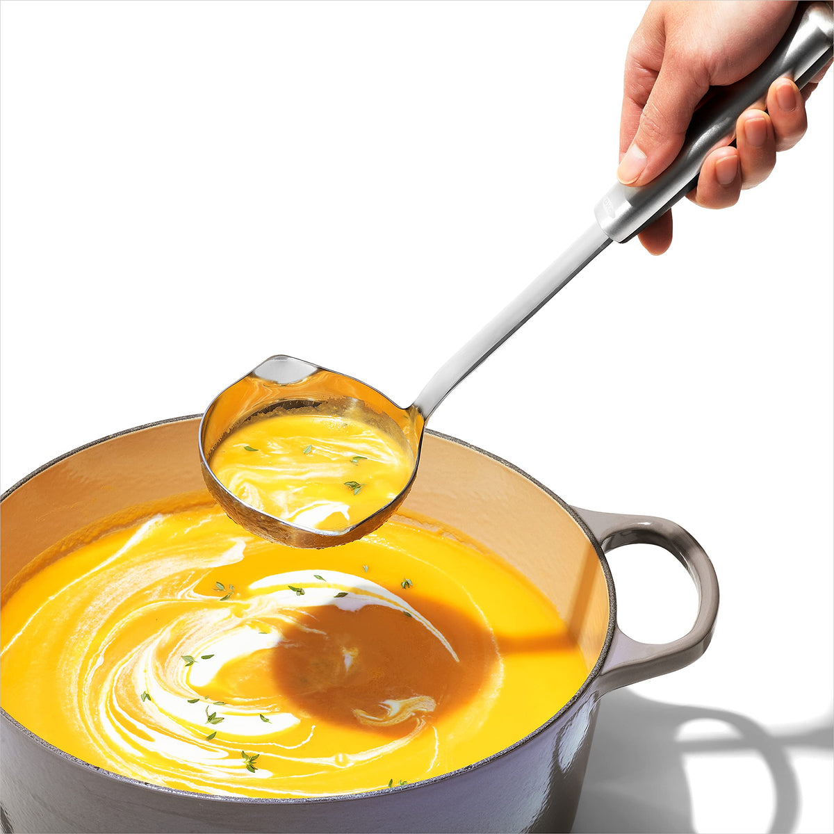 OXO Steel Ladle stainless steel handle with non-slip grip.