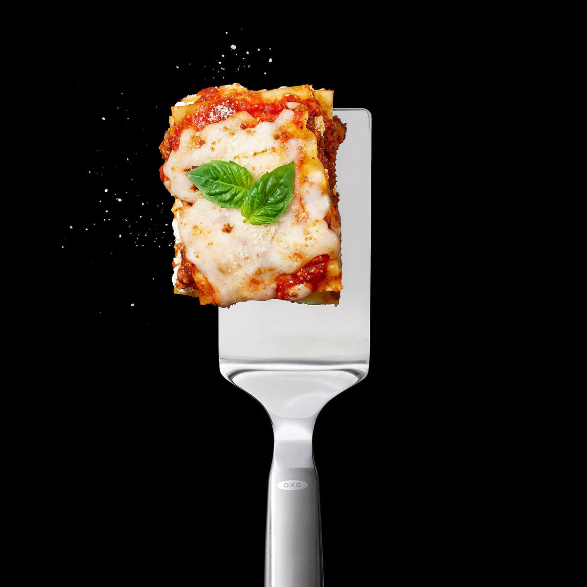 OXO Steel Lasagna Server in use demonstrates versatile serving