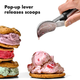 OXO lever ice cream scoop designed for smooth release and comfortable scooping.