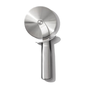 OXO Steel Pizza Wheel blade in action showing a sharp 4-inch cutting edge for clean slices
