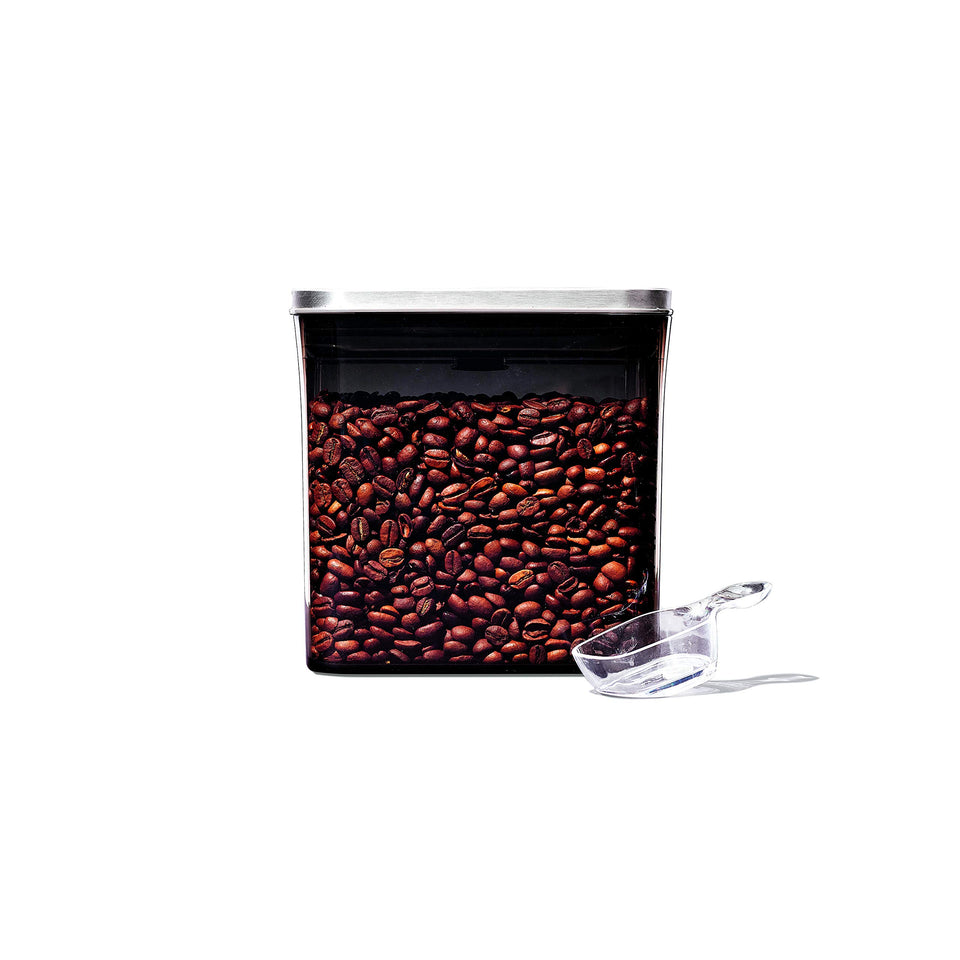 OXO Steel POP coffee container with tinted body protects beans from light.