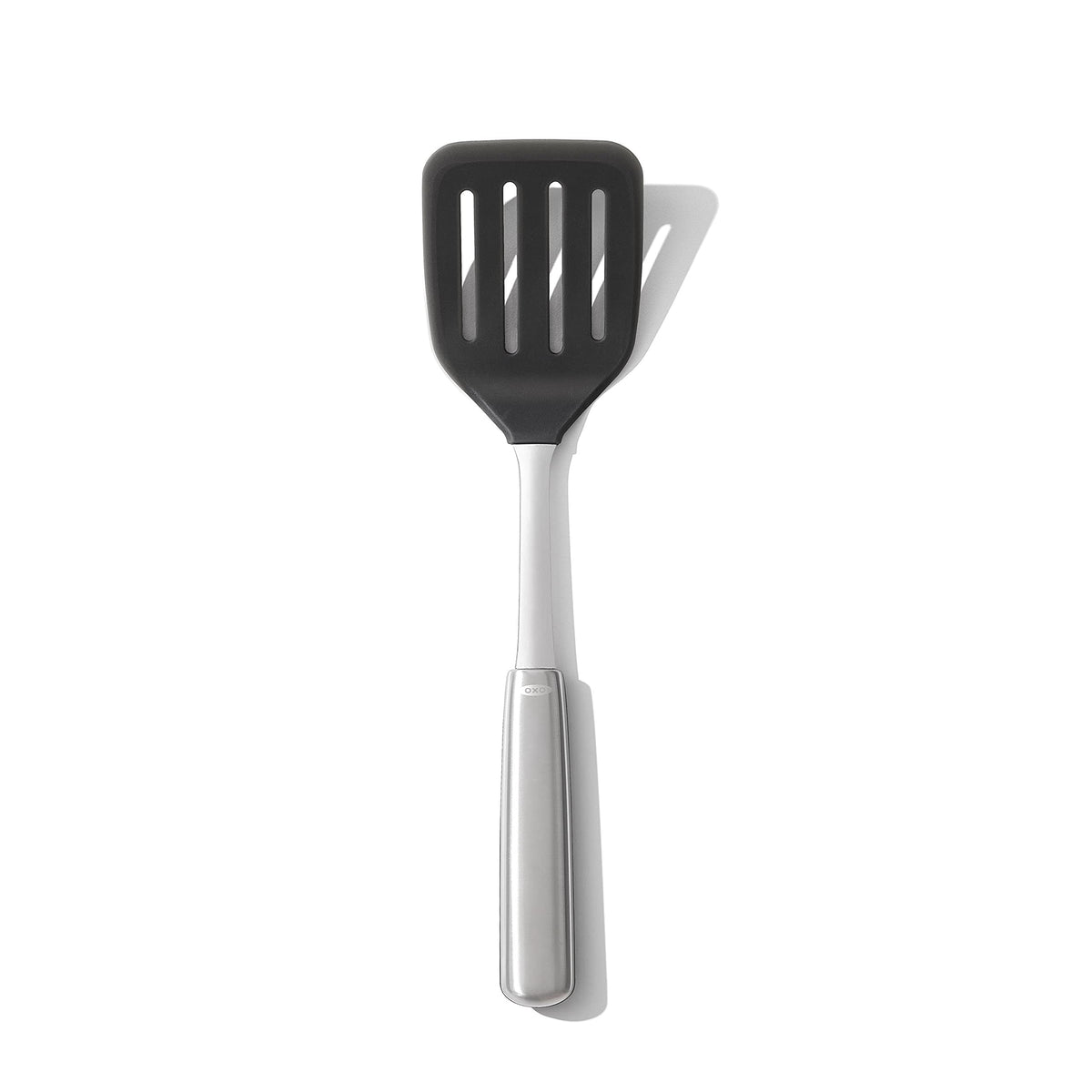 OXO Steel Silicone Flexible Turner head closeup shows heat safe silicone prevents scratching nonstick pans