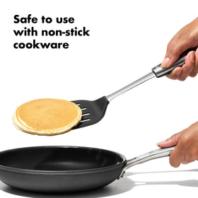 OXO Steel Silicone Flexible Turner on skillet demonstrates safe use with nonstick cookware