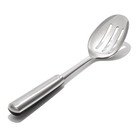 OXO Steel Slotted Spoon scooping meatballs from sauce