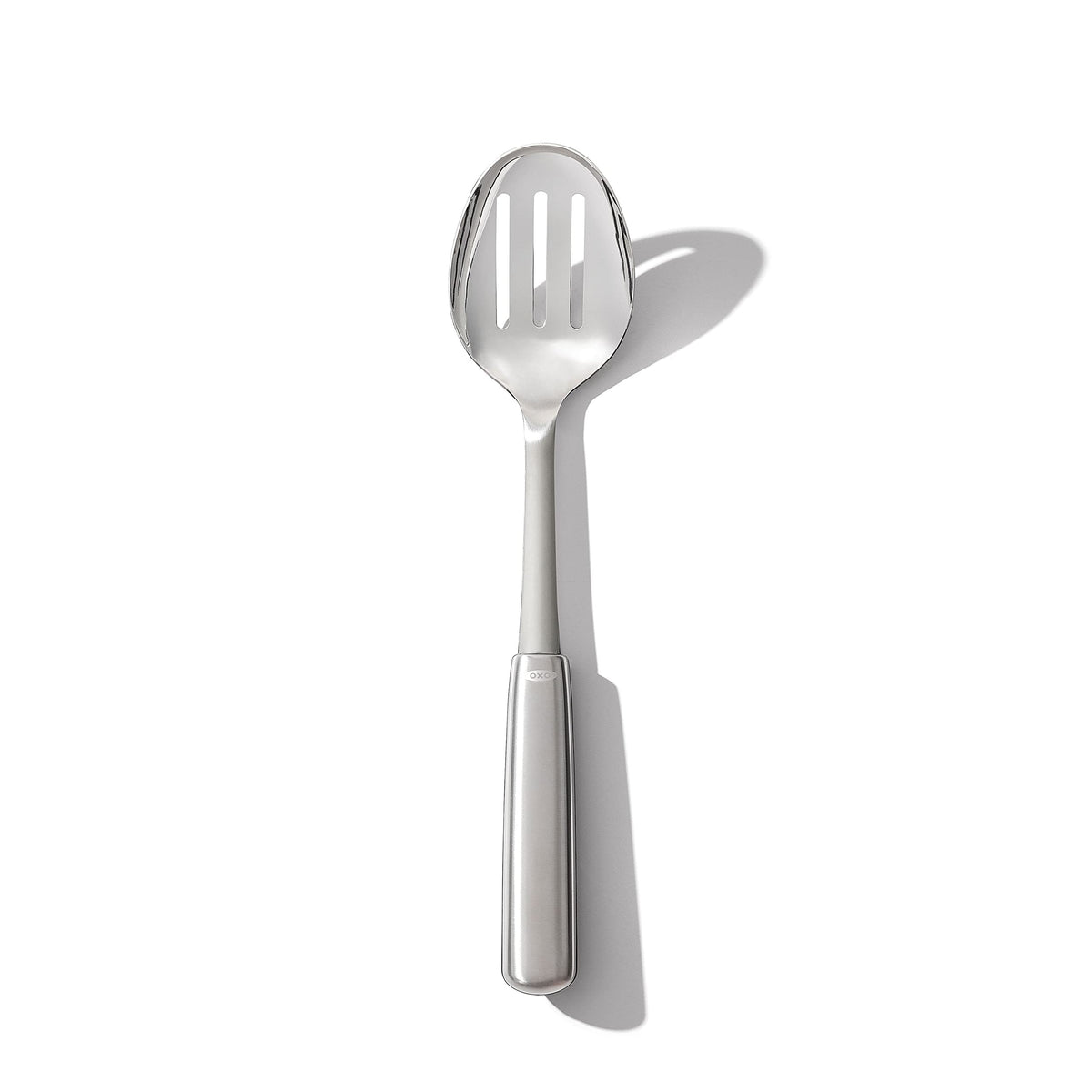 OXO Steel Slotted Spoon straining vegetables from pot
