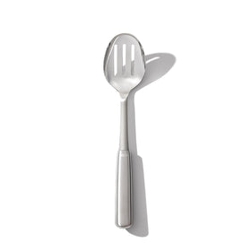 OXO Steel Slotted Spoon straining vegetables from pot