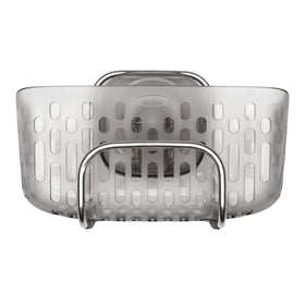 OXO Good Grips StrongHold suction sink caddy keeps sponges and brushes within reach.