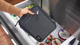 PackIt Freezable Classic Lunch Box buckle handle and exterior pocket for quick access.