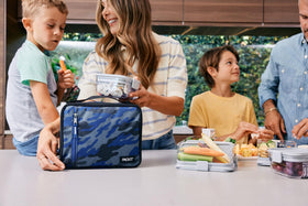 PackIt freezable lunch box in freezer, sporty camo navy ready to chill.