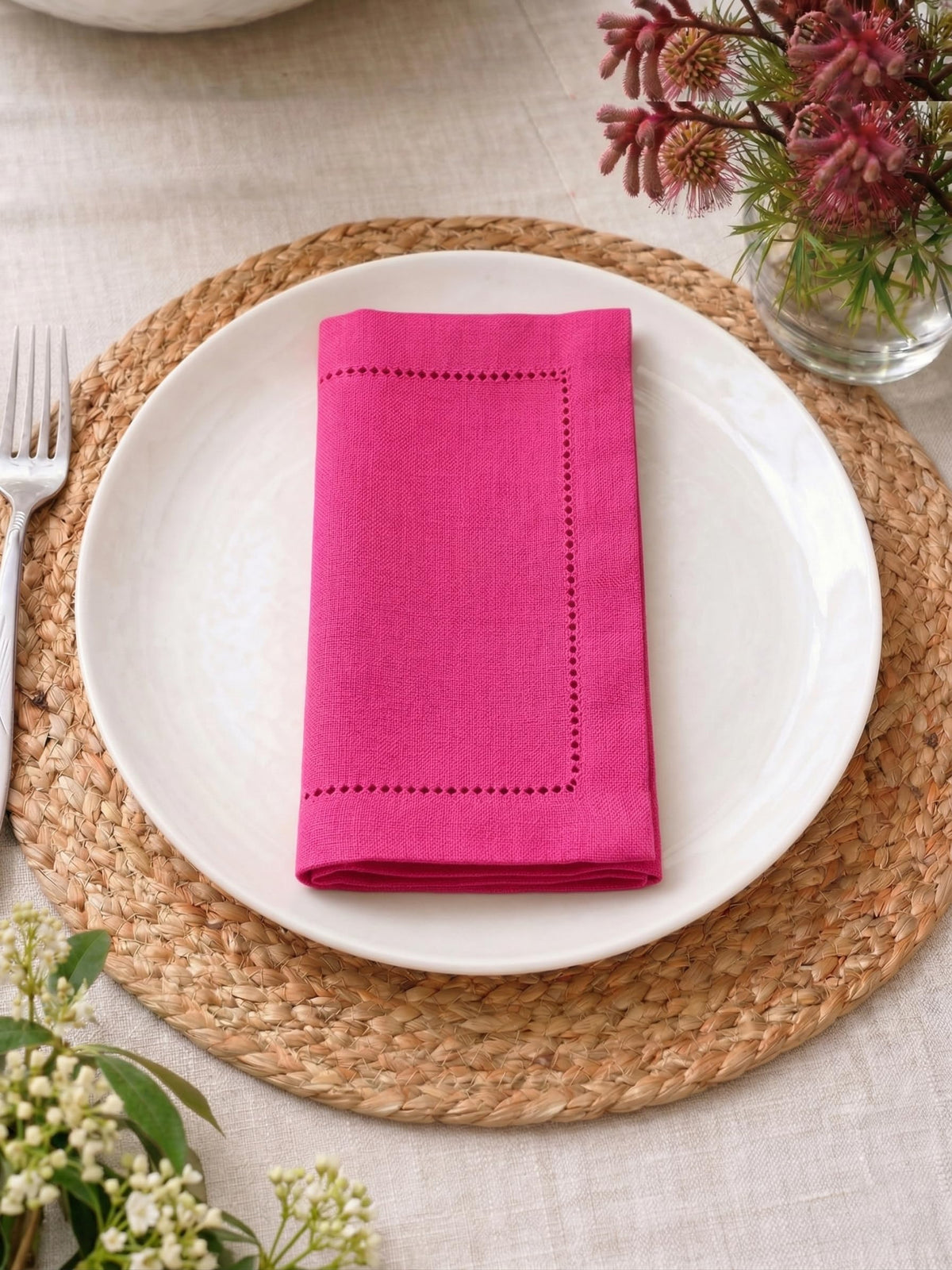 Palisa hemstitch detail napkins add refined texture to formal dinners.