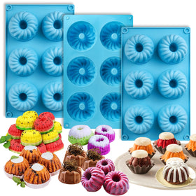 Palksky mini fluted tube pan with six cavities for uniform mini cakes.