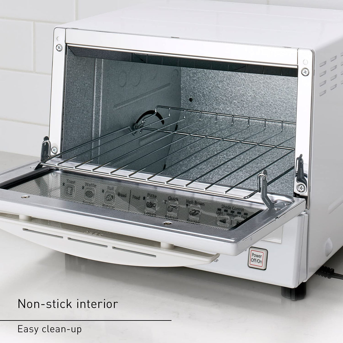 Panasonic FlashXpress removable crumb tray enables quick cleanup.