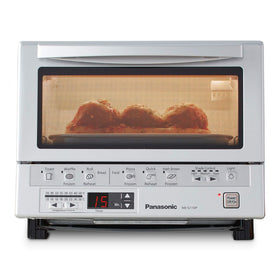 Panasonic FlashXpress toaster oven front view shows compact countertop design ideal for small kitchens.