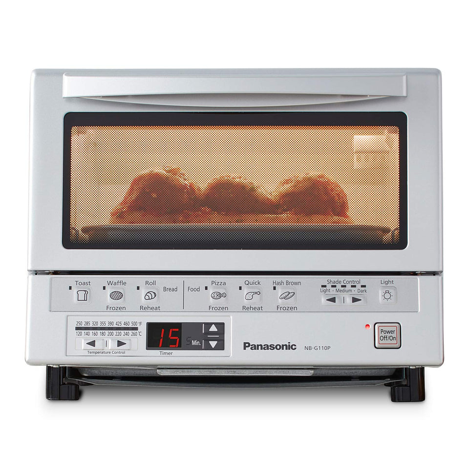 Panasonic FlashXpress toaster oven front view shows compact countertop design ideal for small kitchens.