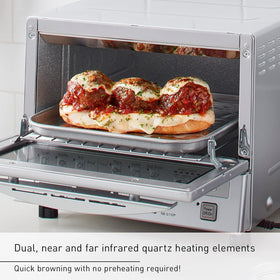 Panasonic FlashXpress interior with removable crumb tray for quick cleanup.