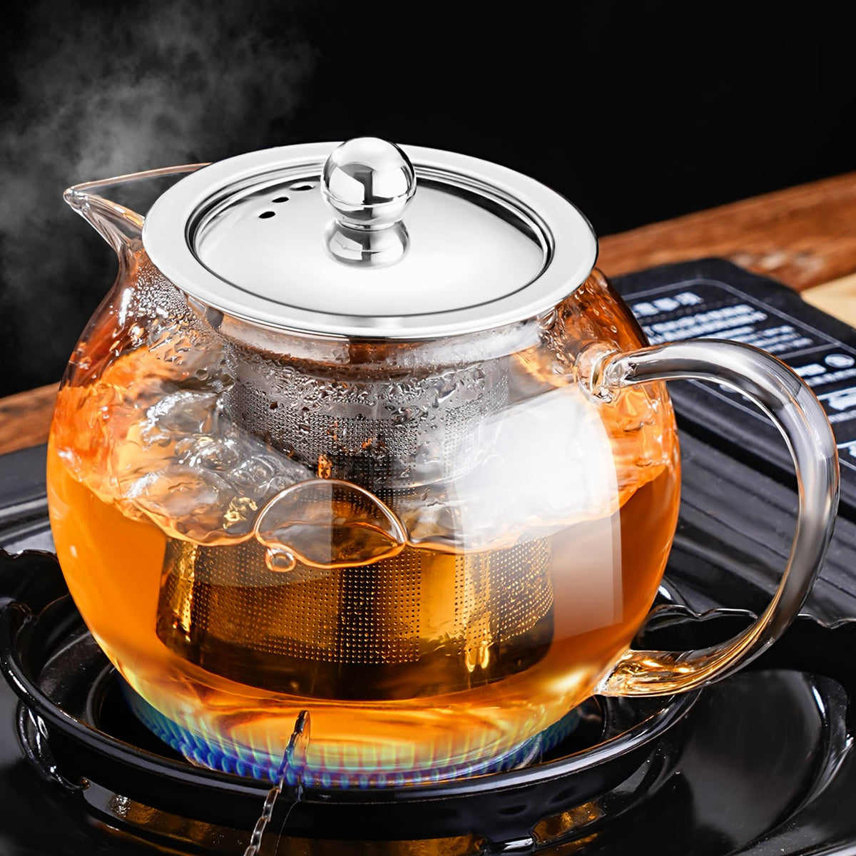 PARACITY glass teapot on stove showing 22 oz capacity for sharing