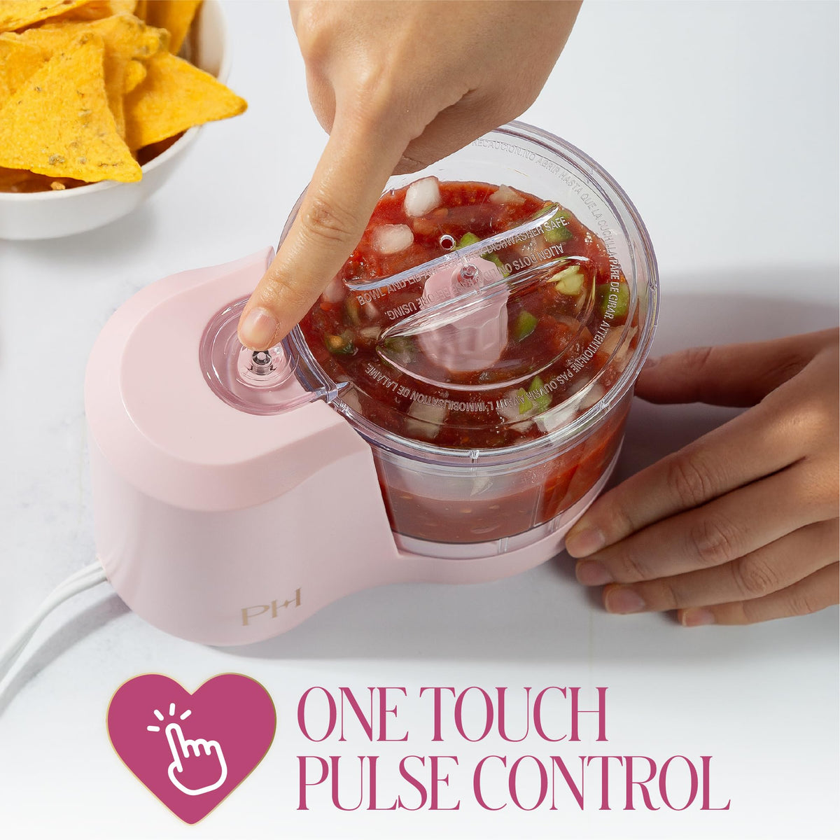 Paris Hilton 1.5-Cup Pink Chopper blade close-up in stainless steel