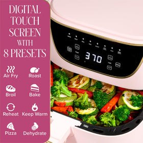 Paris Hilton Air Fryer basket and crisper tray enable low-oil cooking.