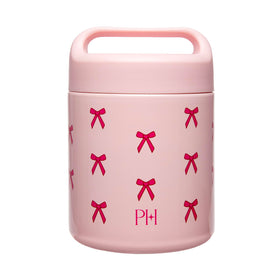 Paris Hilton food jar with pink bow design for on-the-go snacking.