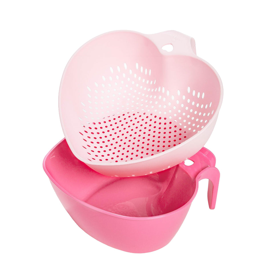 Paris Hilton Heart Bowl & Colander pink nesting set, perfect for efficient kitchen prep and storage.