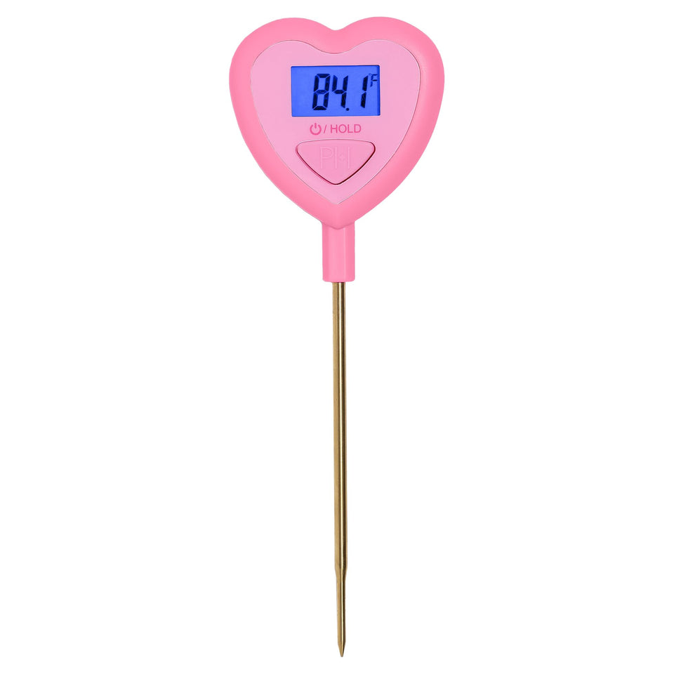 Paris Hilton heart-shaped thermometer in pink front view for quick kitchen temperature checks.