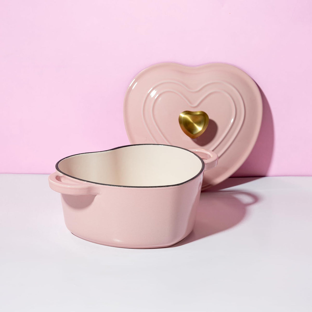 Paris Hilton induction-compatible Dutch oven for versatile stovetop cooking.