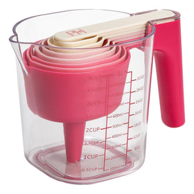 Paris Hilton pink measuring cups neatly nested for quick, precise ingredient prep.