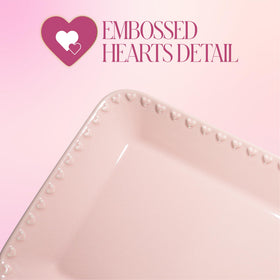 Paris Hilton pink embossed-heart tray used for charcuterie and light bites.
