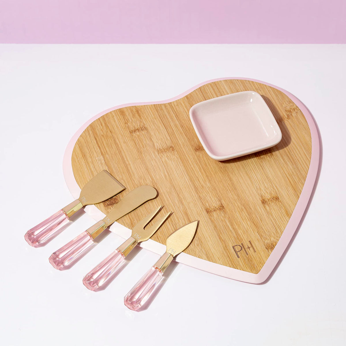 Paris Hilton table setting glam with board and tools for memorable evenings