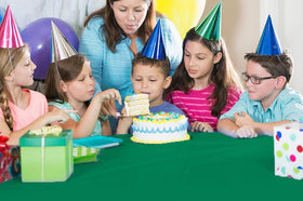Party Solids emerald green table cover used in wedding or party decor.