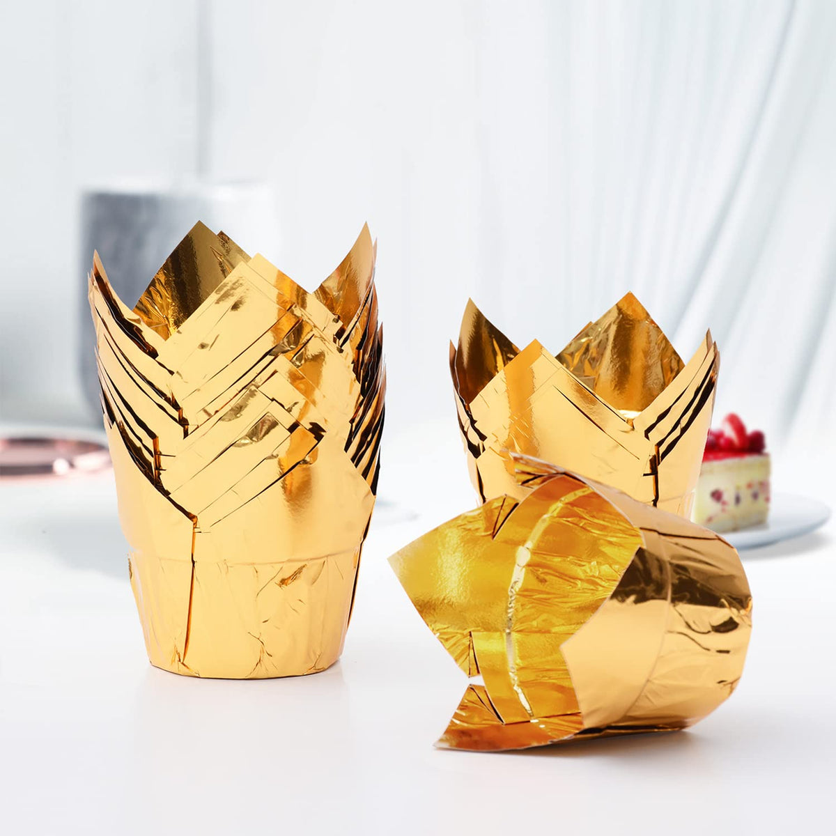 Party Hippo Gold Tulip Cupcake Liners show oven-safe cups for baking cupcakes and muffins.