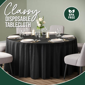 Party Solids round tablecloth on a dining table for indoor or outdoor gatherings.