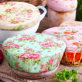 Patelai bowl covers patterns in red, pink, green and floral for cheerful kitchen prep.