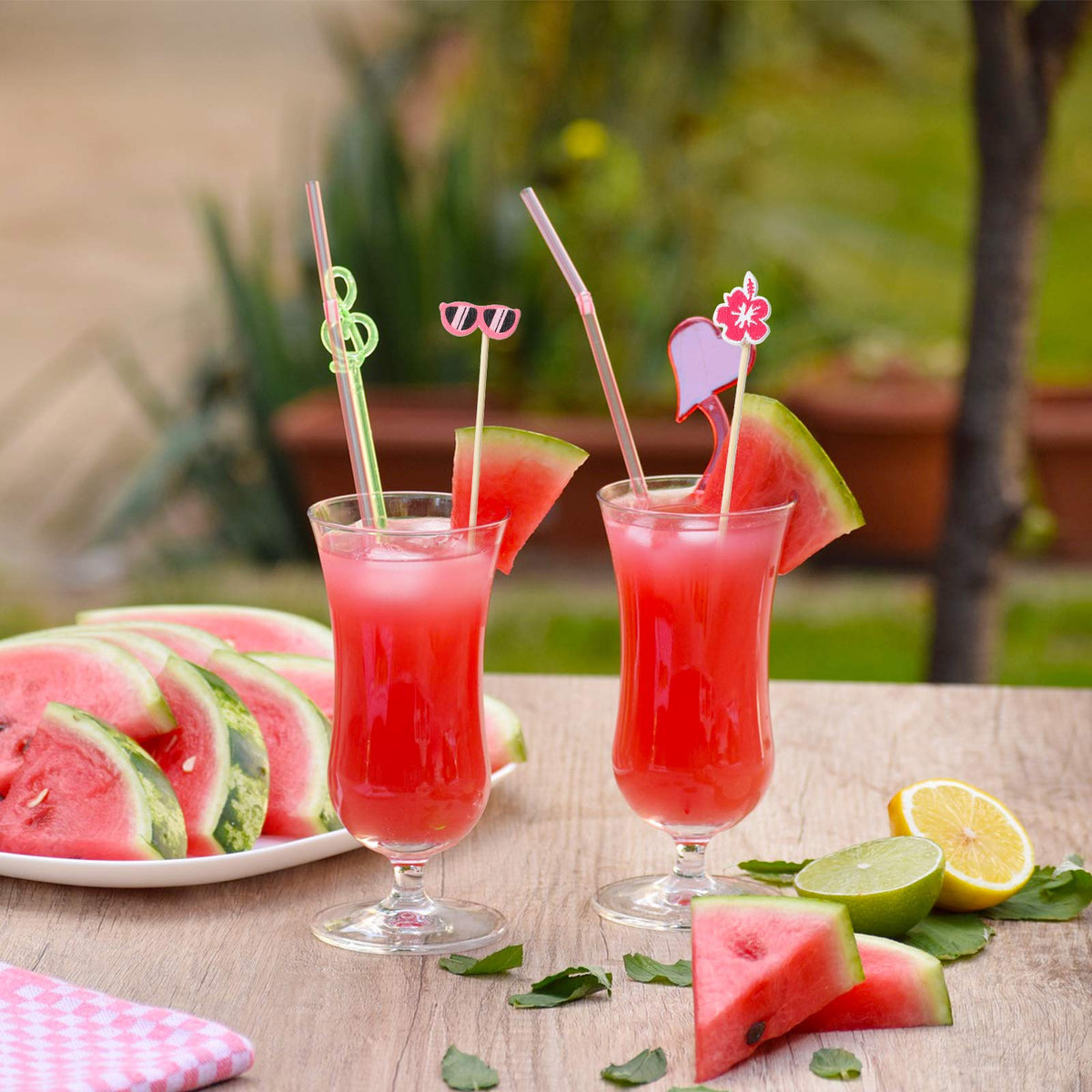 Patelai Luau Picks coconut tree design accenting tropical party trays.